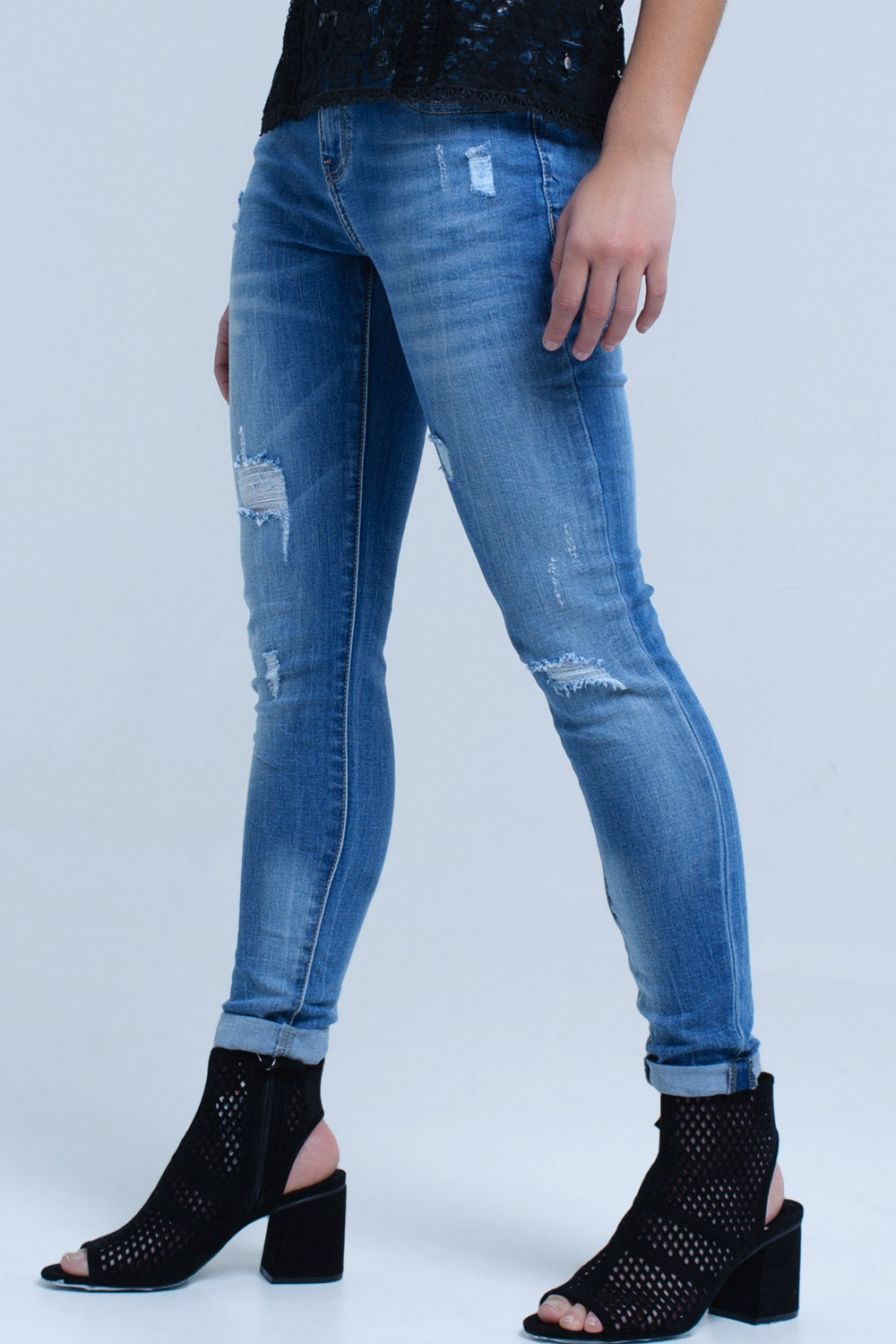 Jeans skinny avec déchirures