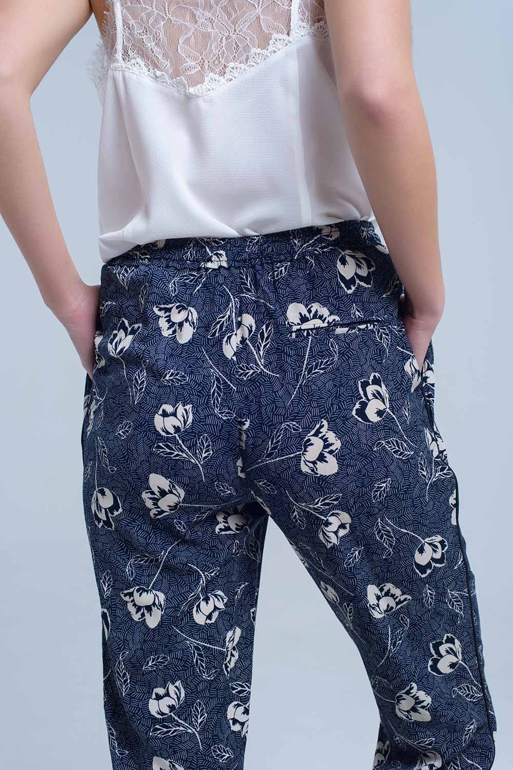 Pantalon bleu marine à imprimé floral