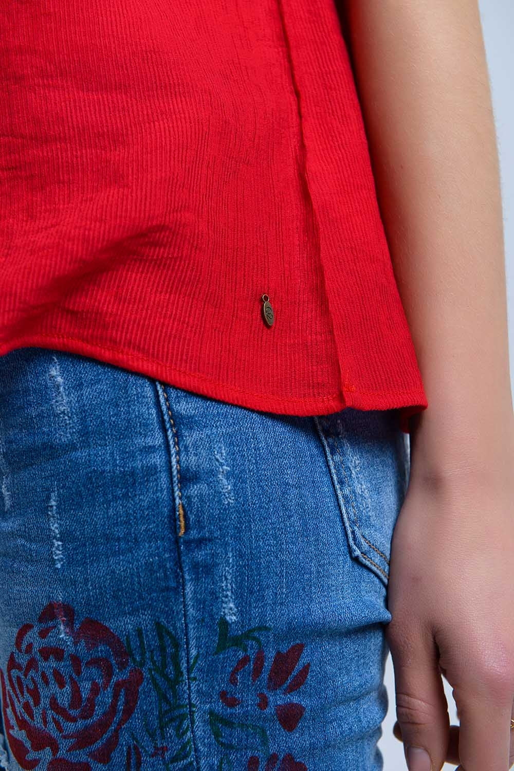 Jean skinny avec fleurs peintes