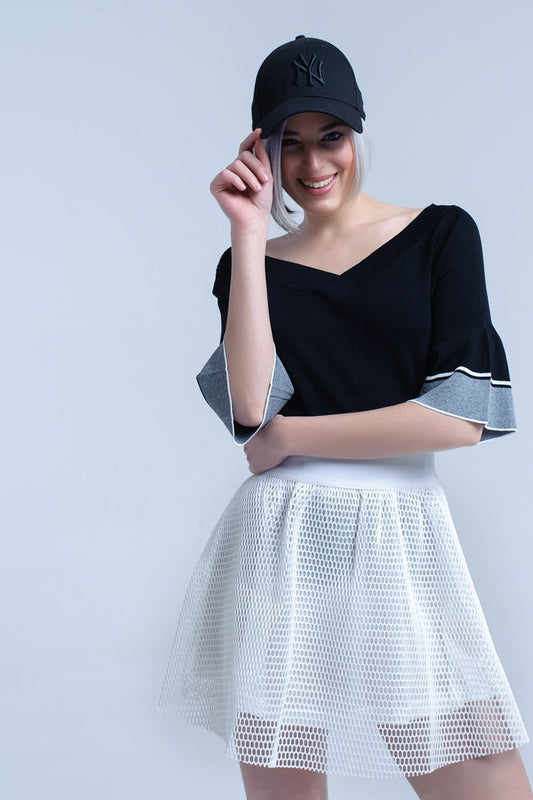 Pull en maille noire avec manches cloche