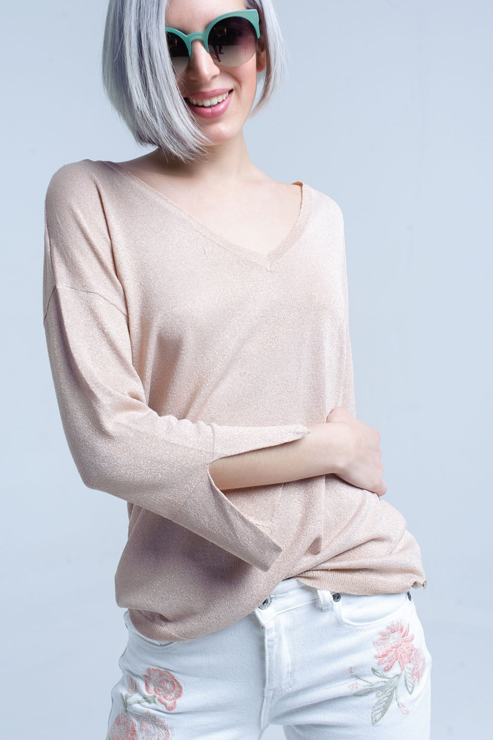 Pull en maille rose avec détail en lurex doré