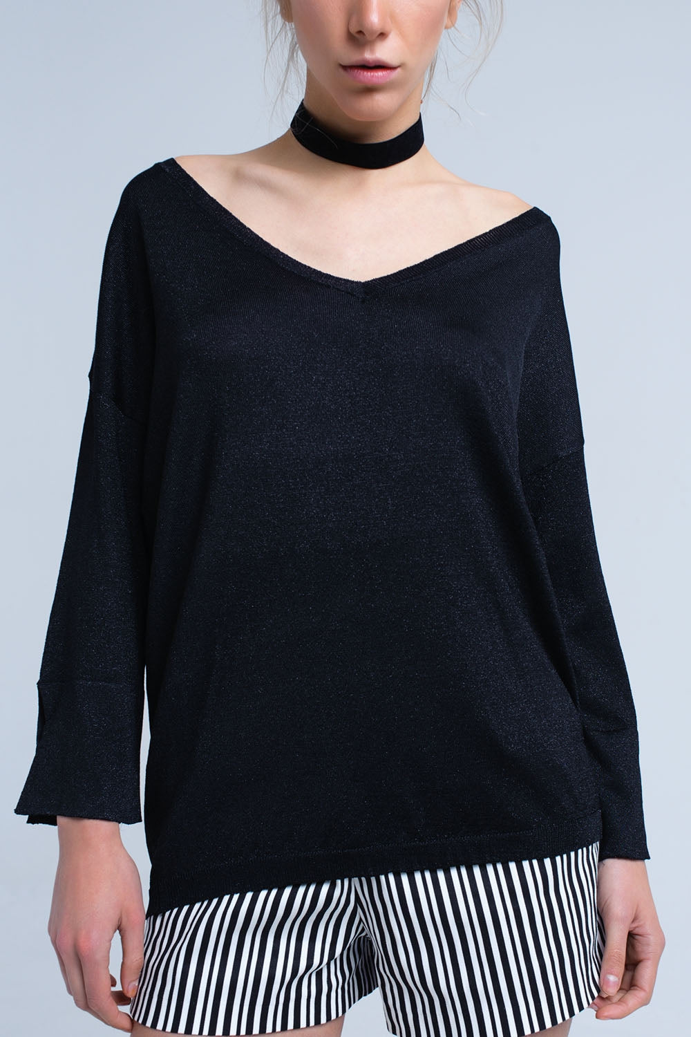 Pull en maille noire avec détail en lurex doré