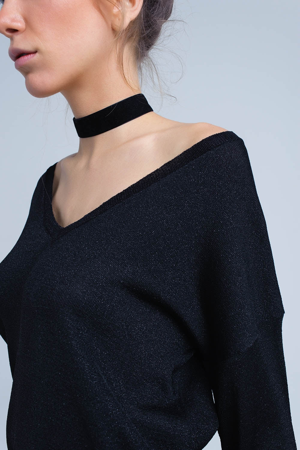 Pull en maille noire avec détail en lurex doré