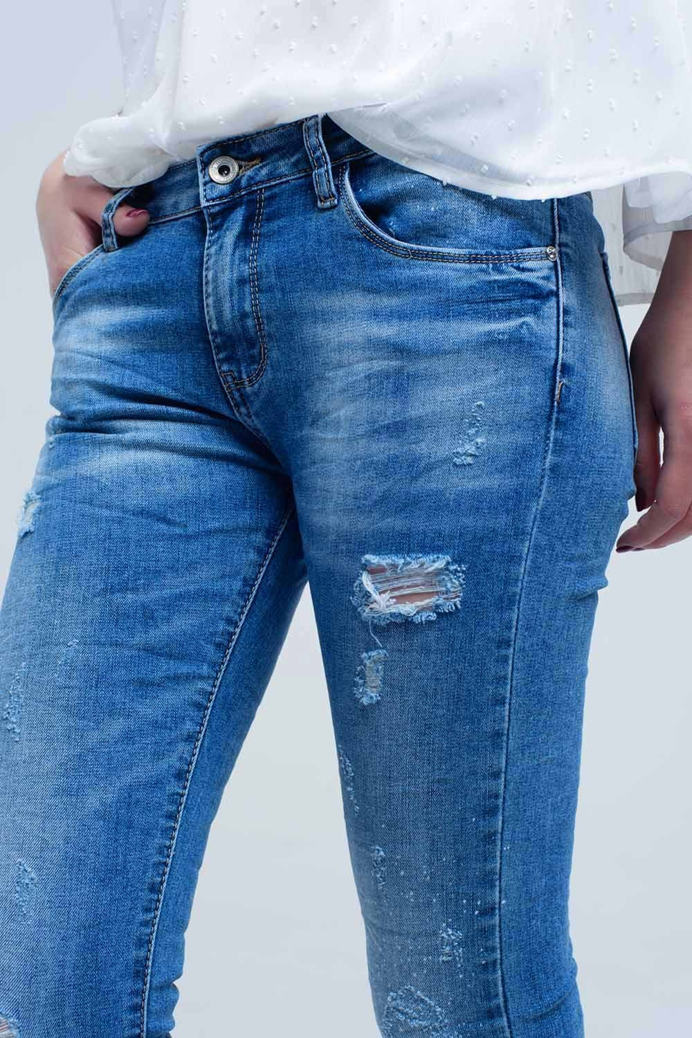 Jeans skinny à lavage moyen avec déchirures