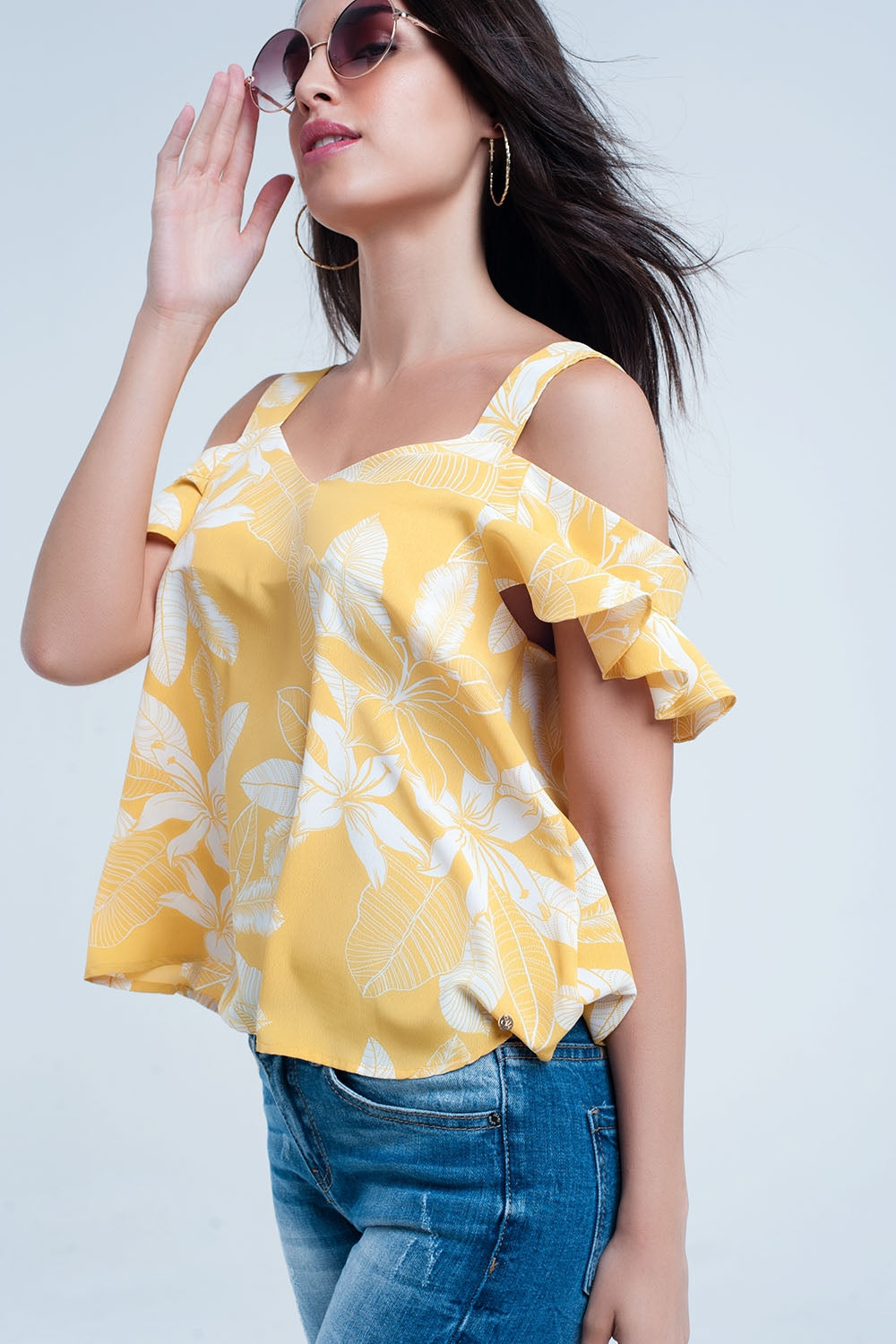 Top fleur jaune et volants