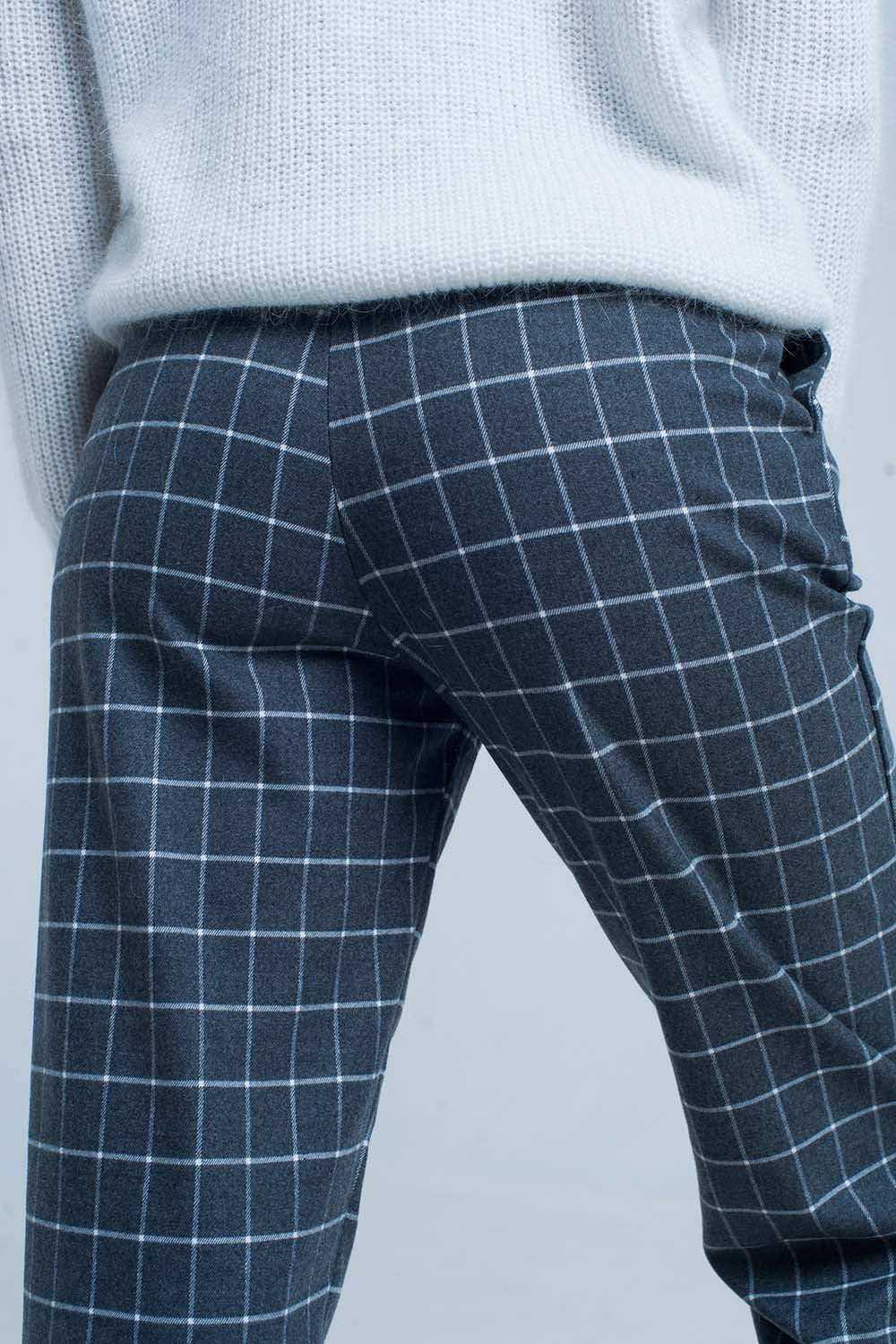 Pantalon gris à carreaux blanc