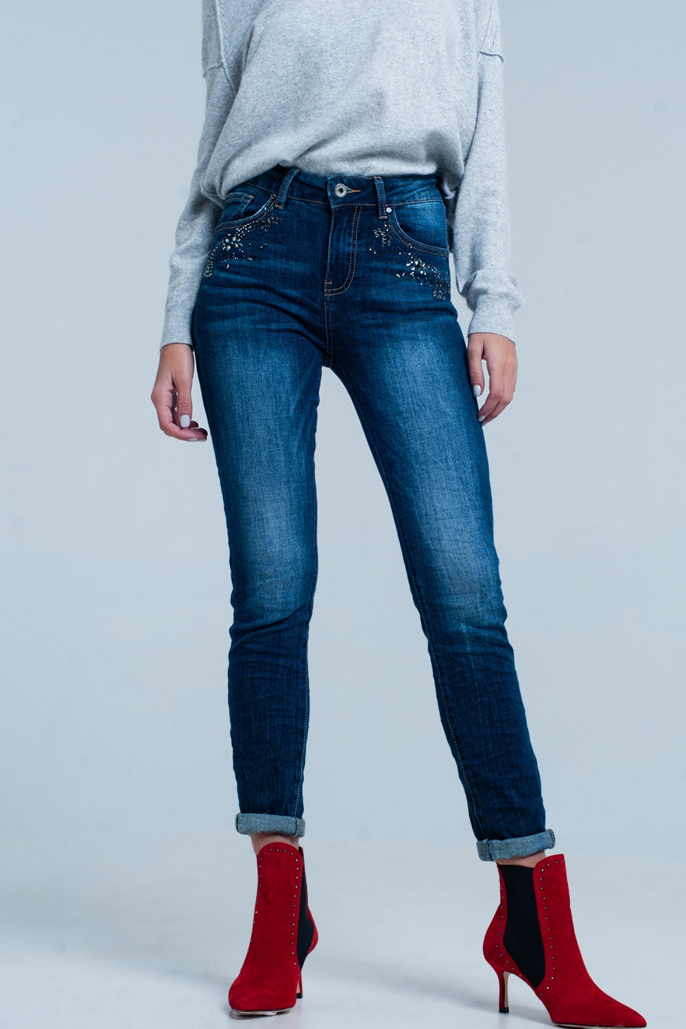 Jean taille haute délavé foncé avec détails en strass