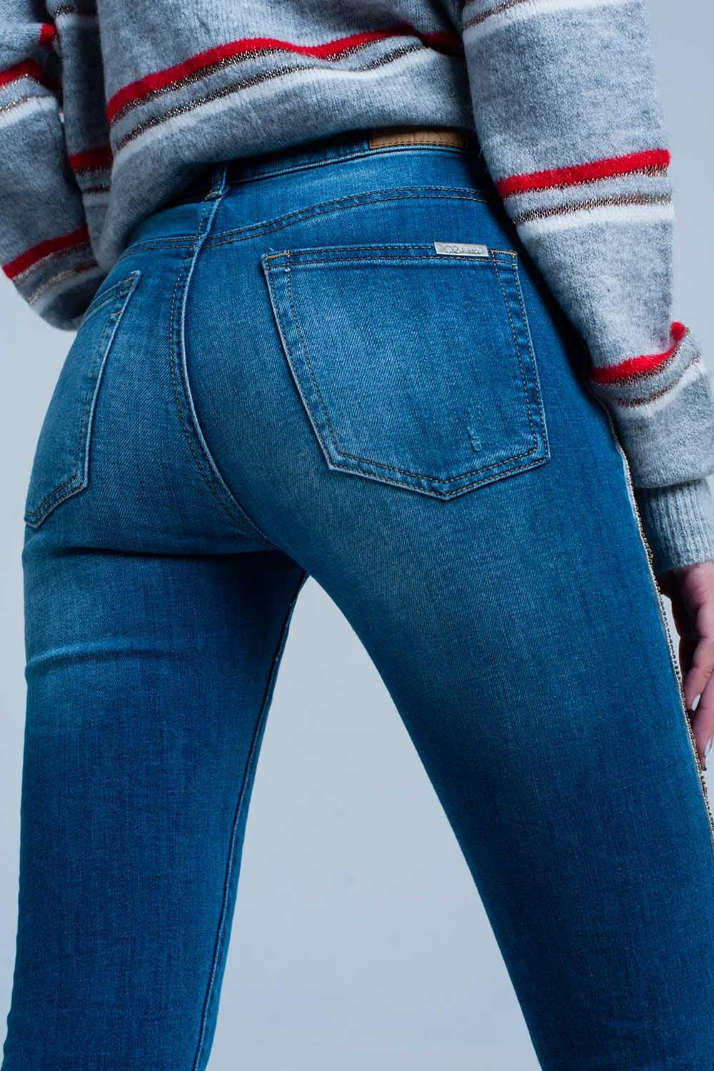 Jean skinny à franges avec bande latérale en strass