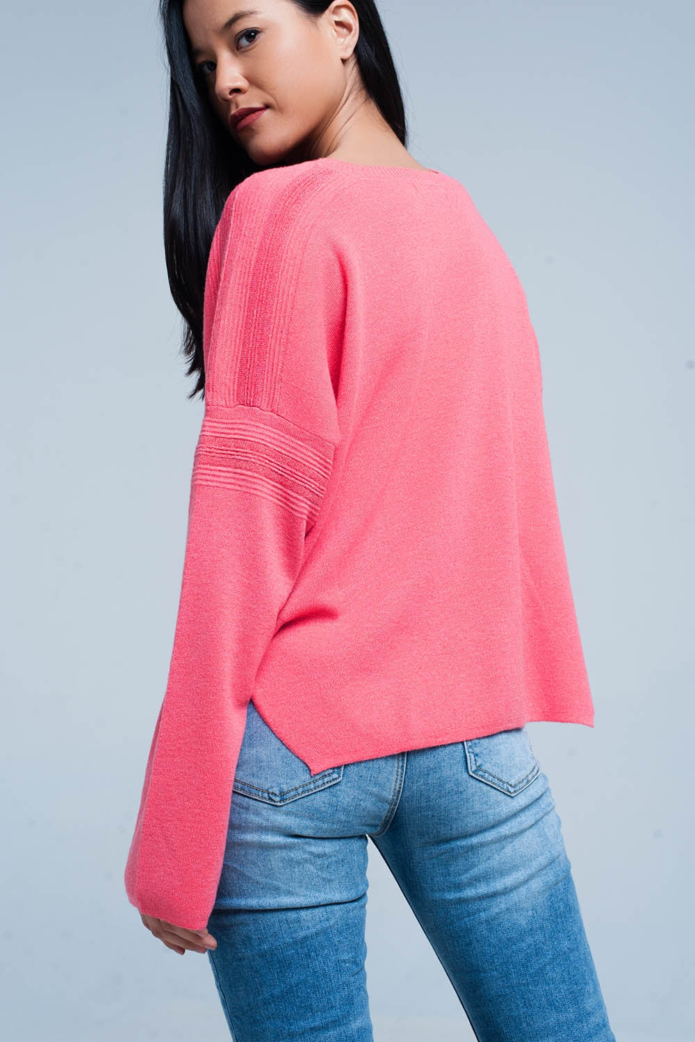 Pull fin tricoté corail avec détails du scintillement