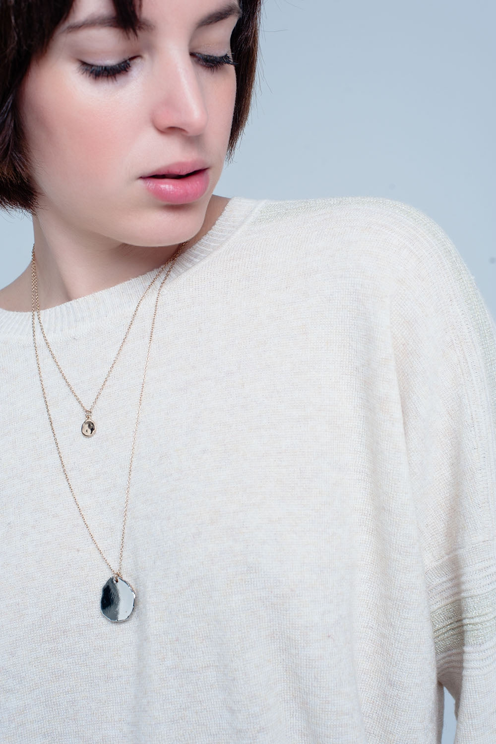 Pull fin tricoté beige avec détails du scintillement