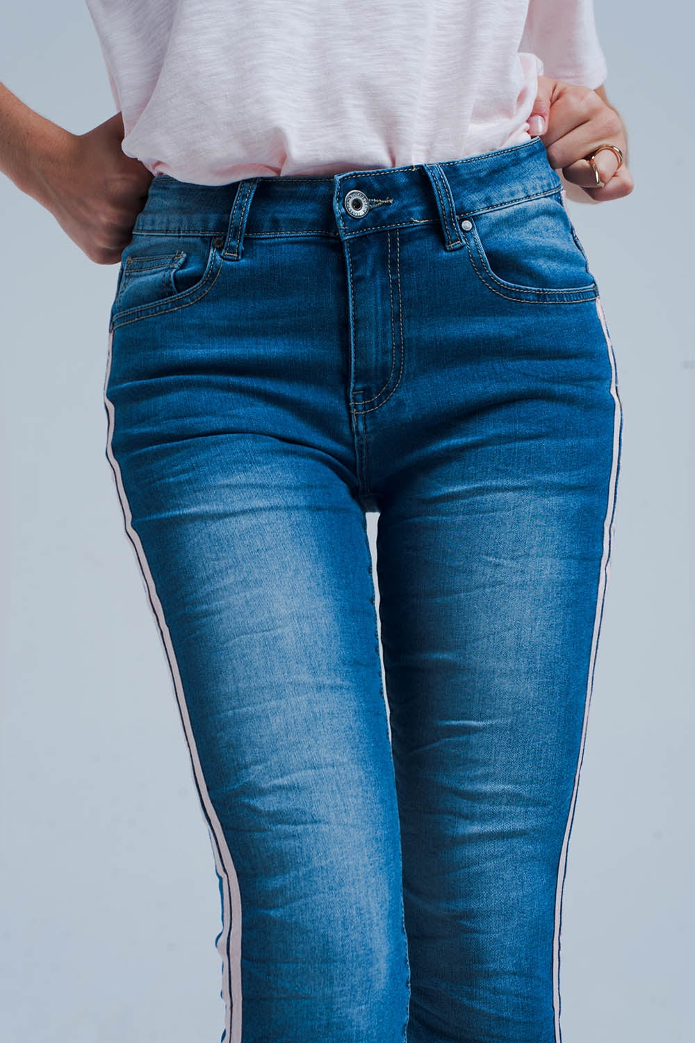 Jean skinny à rayures latérales roses