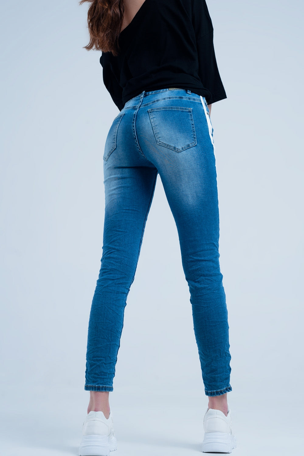Jean skinny avec bande sur la couture latérale