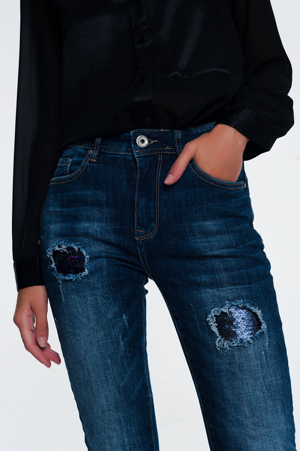 jean à sequins et déchirures
