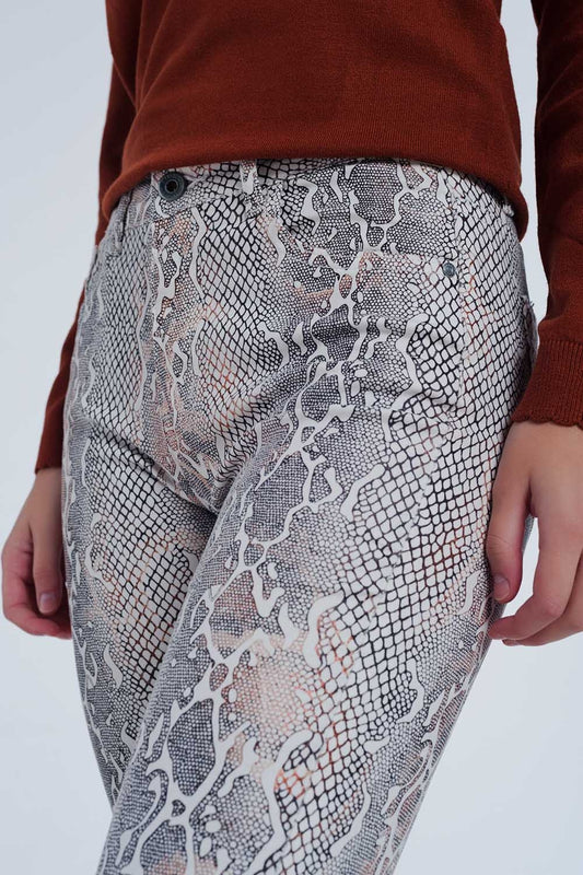 Pantalon texturé à imprimé serpent beige
