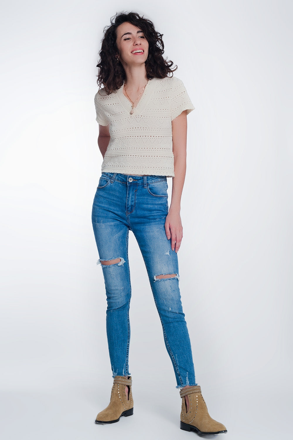 jeans super skinny avec des trous dans les genoux