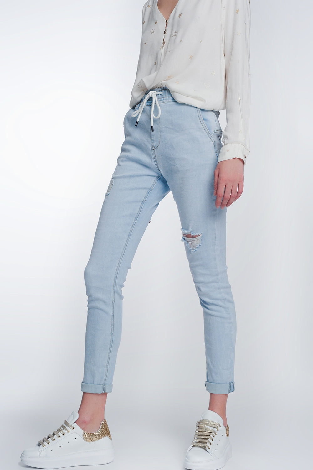 Jean style jogger délavage lumière