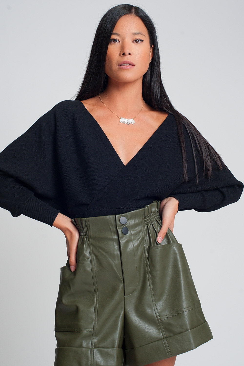 Pull en maille avec col en V enveloppé en noir