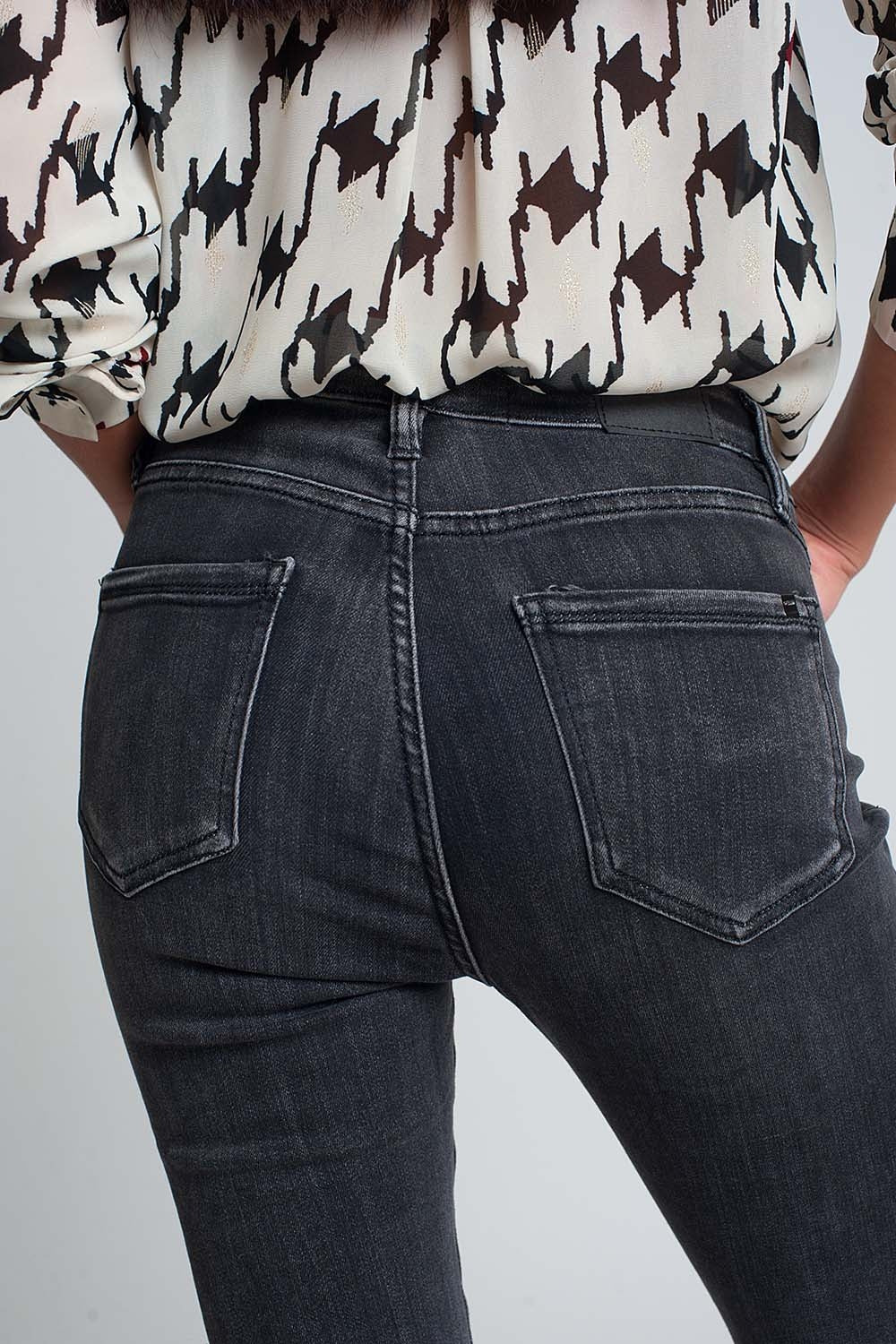 Jean skinny taille haute en Noir délavé