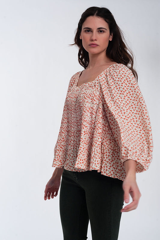 Top à fleurs avec manches bouffantes et encolure carrée corail