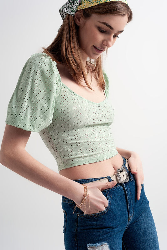 Haut court vert en tissu batiste et manches bouffantes