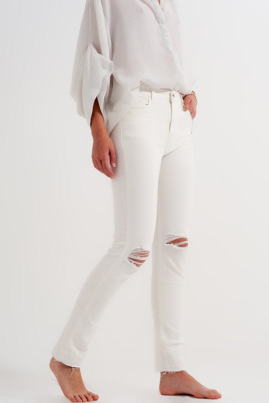 Jean déchiré avec ourlet à franges crème