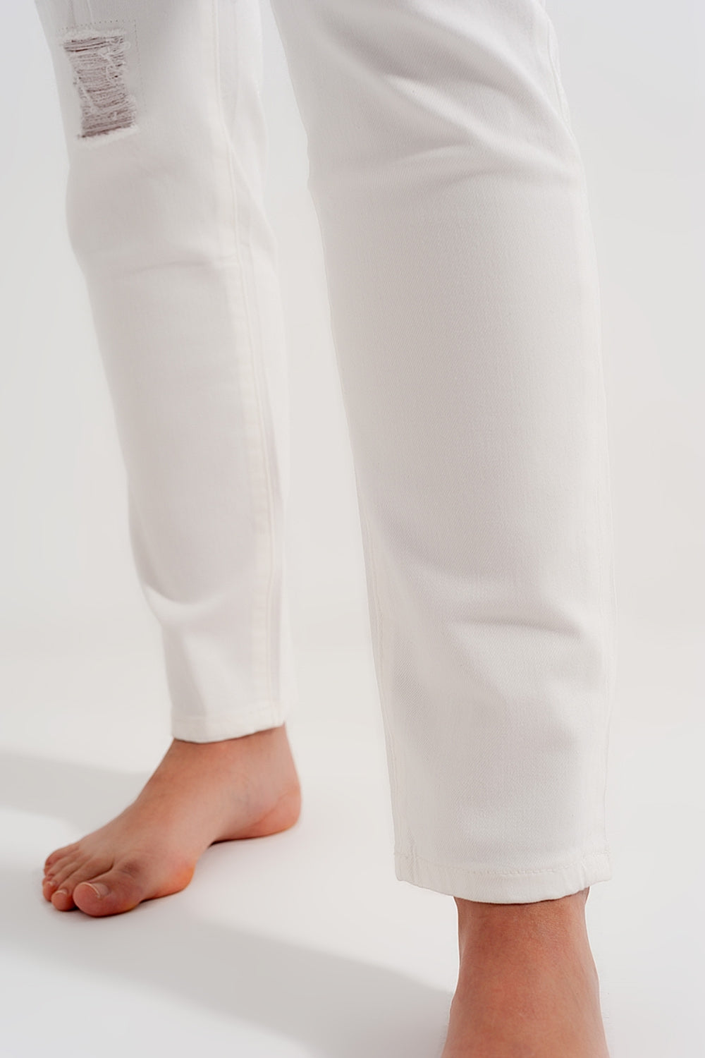 Jean slim avec abrasions blanc