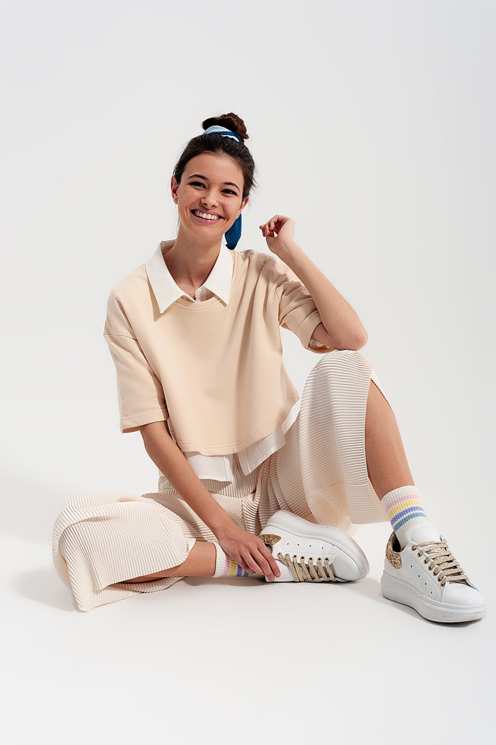 Pantalon plissé style jupe culotte crème