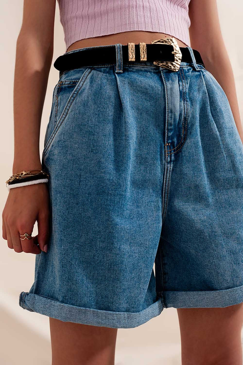 Short en jean à taille haute et à pinces délavage moyen