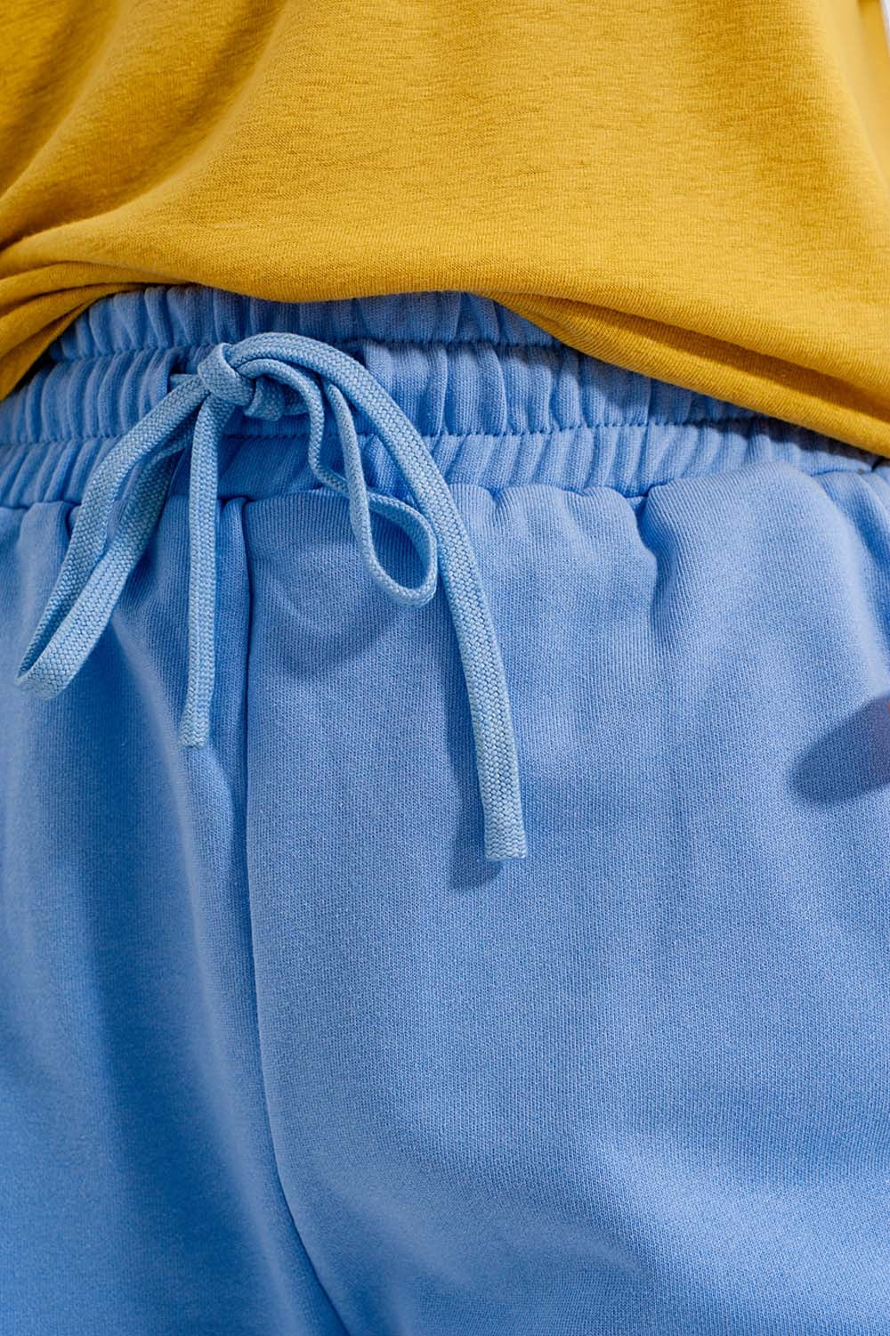 Short slim court en jersey bleu