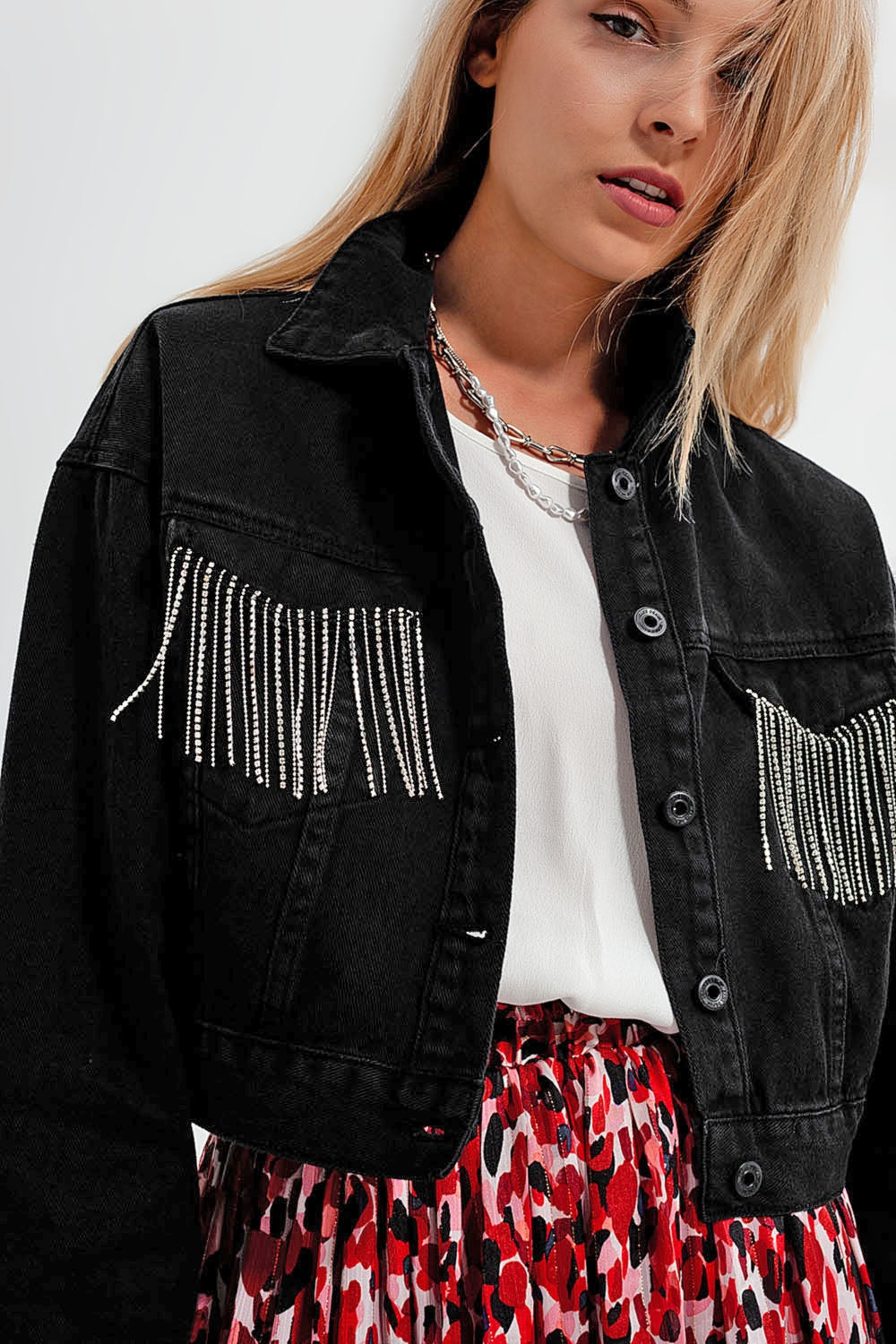 Veste noir en denim  à franges ornées de strass