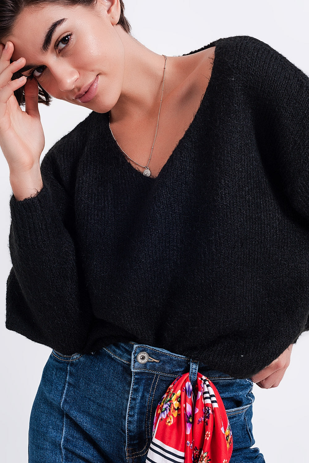 Pull duveteux noir chauve-souris