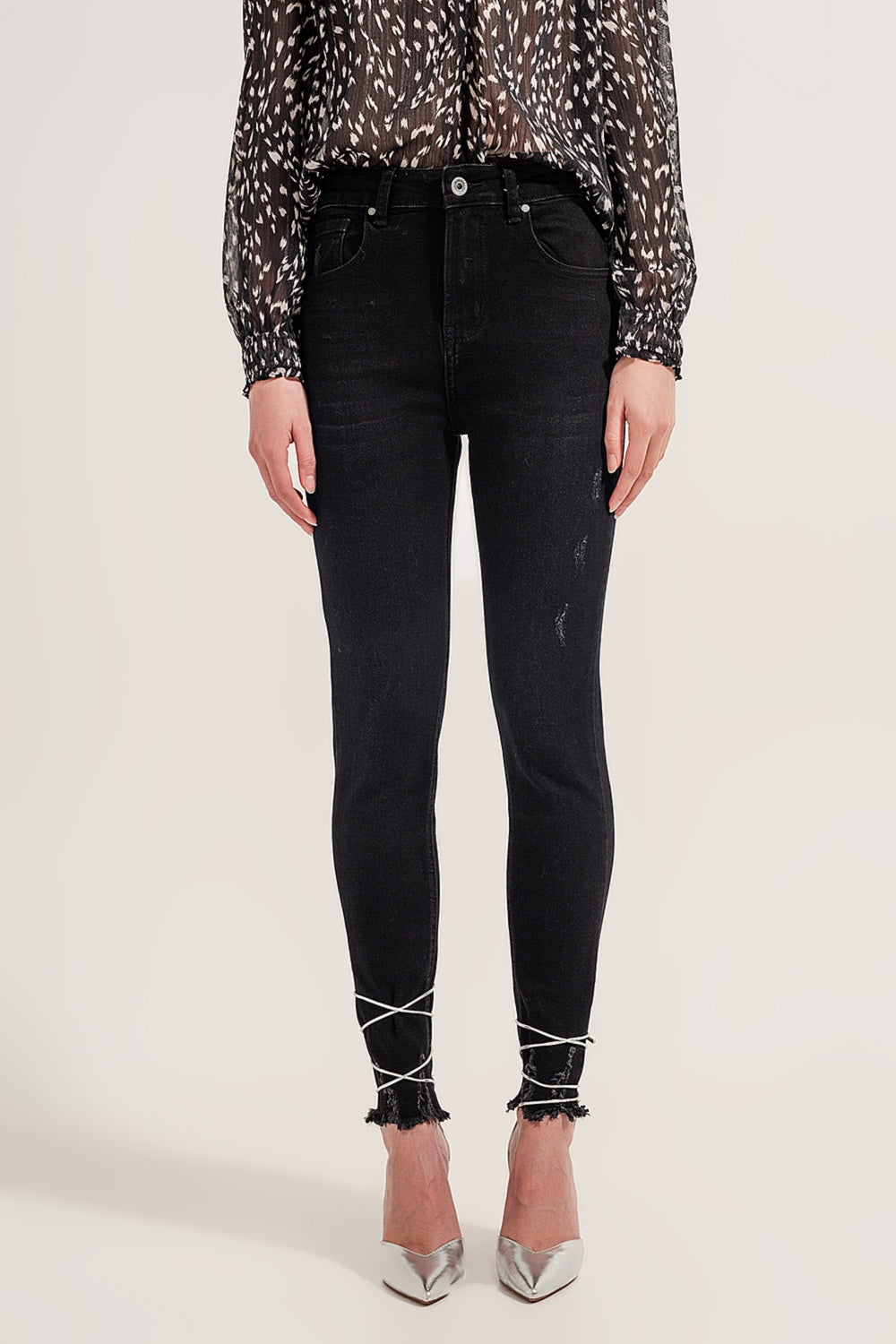 Jean skinny à ourlets bruts Noir