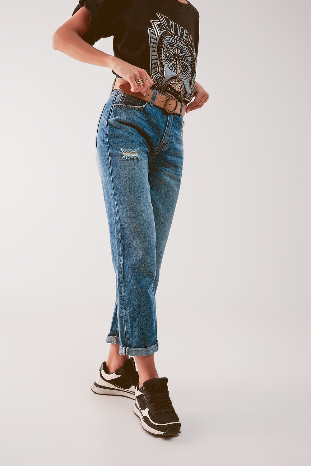 Jean taille haute avec cuisse fendue