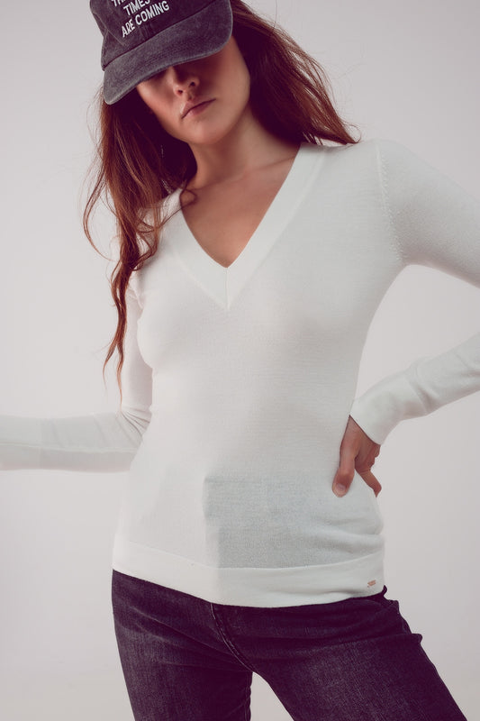 Pull en maille fine col V crème