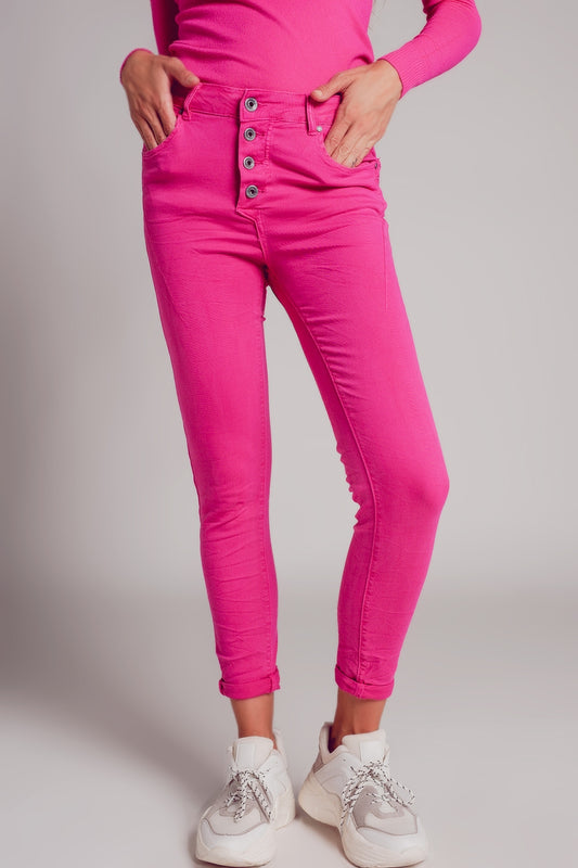 Jean skinny avec boutons visibles fuchsia