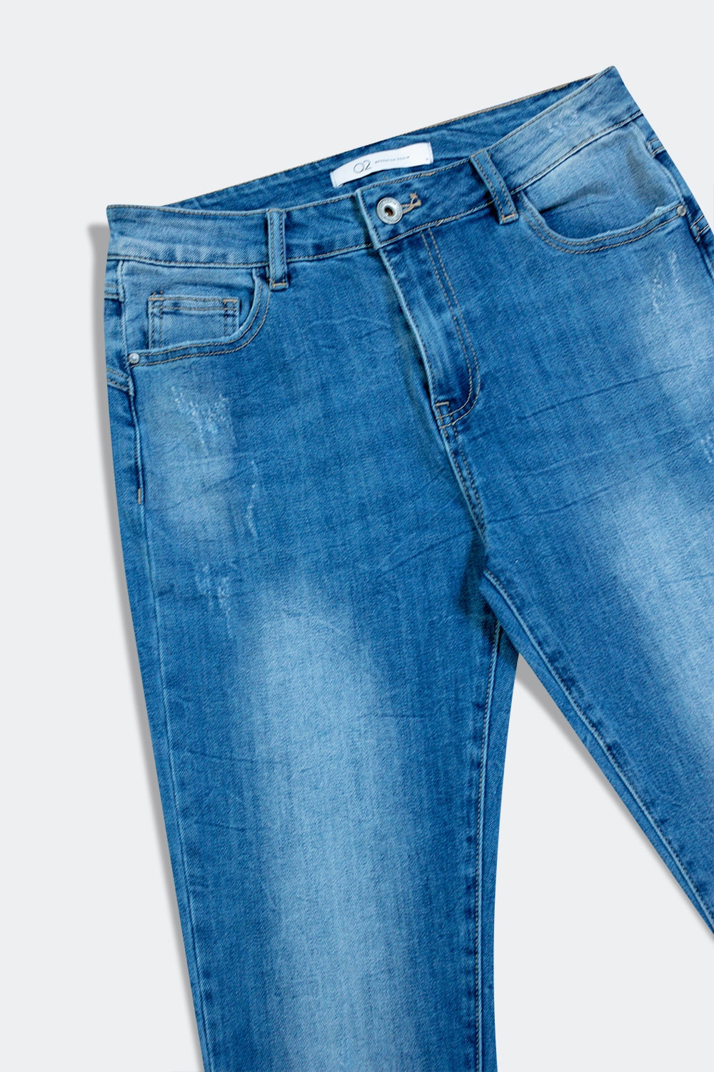 Jean cigarette taille haute à délavage moyen