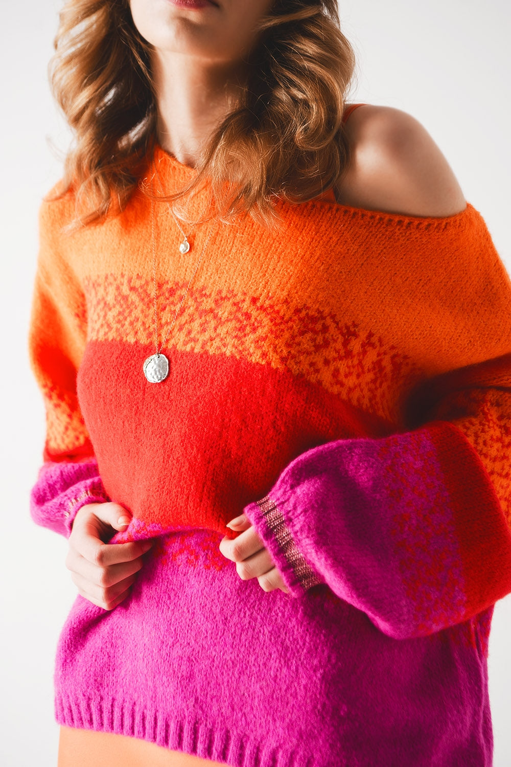 Pull en tricot orange à rayures mélangées