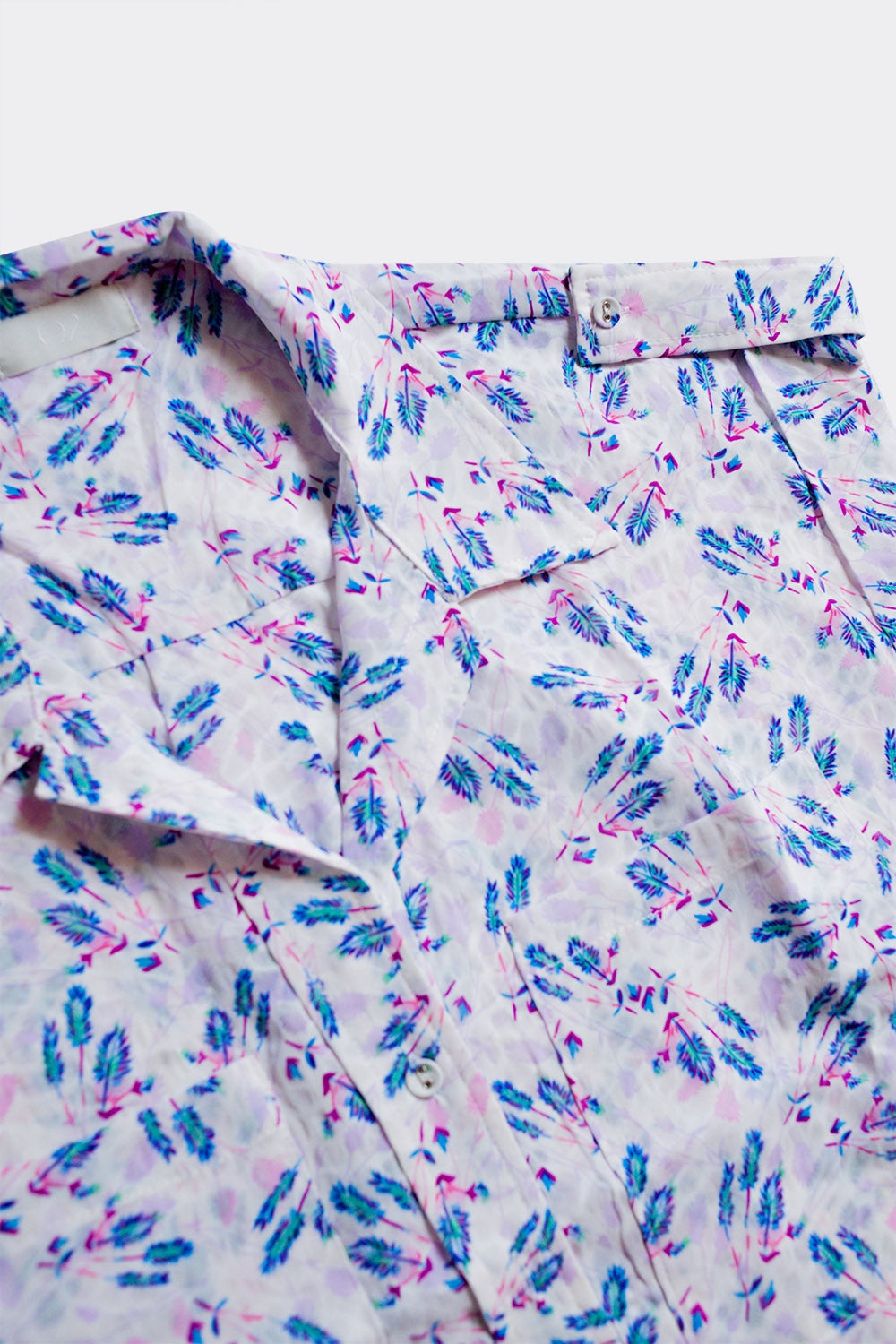 Blouse mauve avec poches et imprimé floral