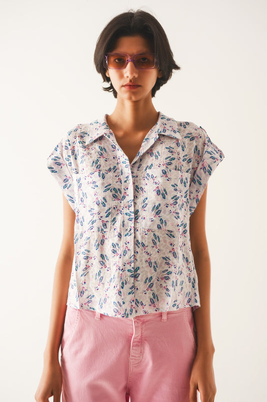 Blouse mauve avec poches et imprimé floral
