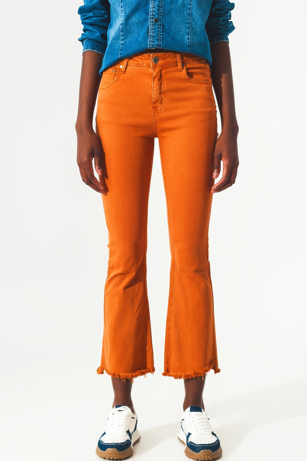 Jean flare avec bord brut en orange