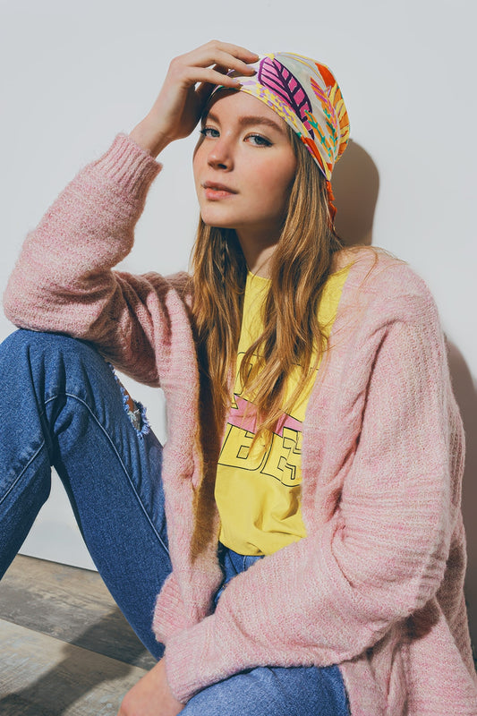 Cardigan tricoté en rose