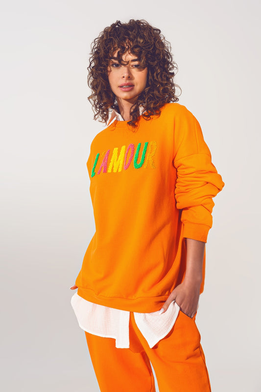 Pull L'amour Text en Orange