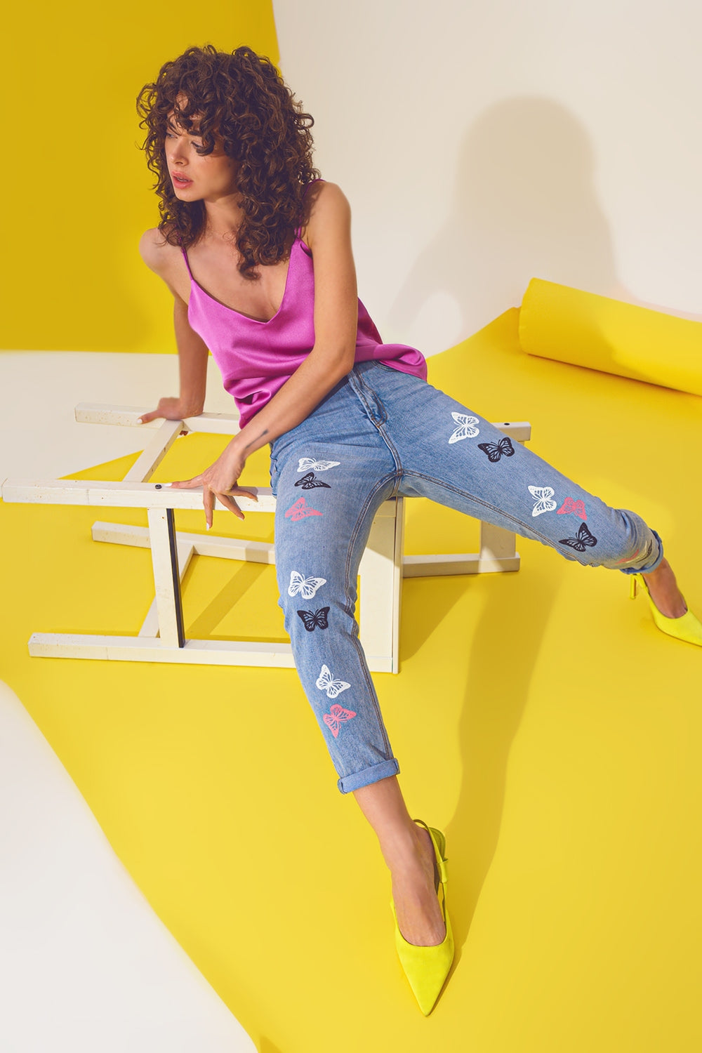 Jean skinny avec détail papillon délavé bleu clair