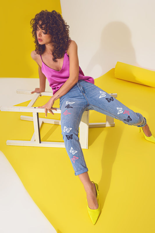 Jean skinny avec détail papillon délavé bleu clair