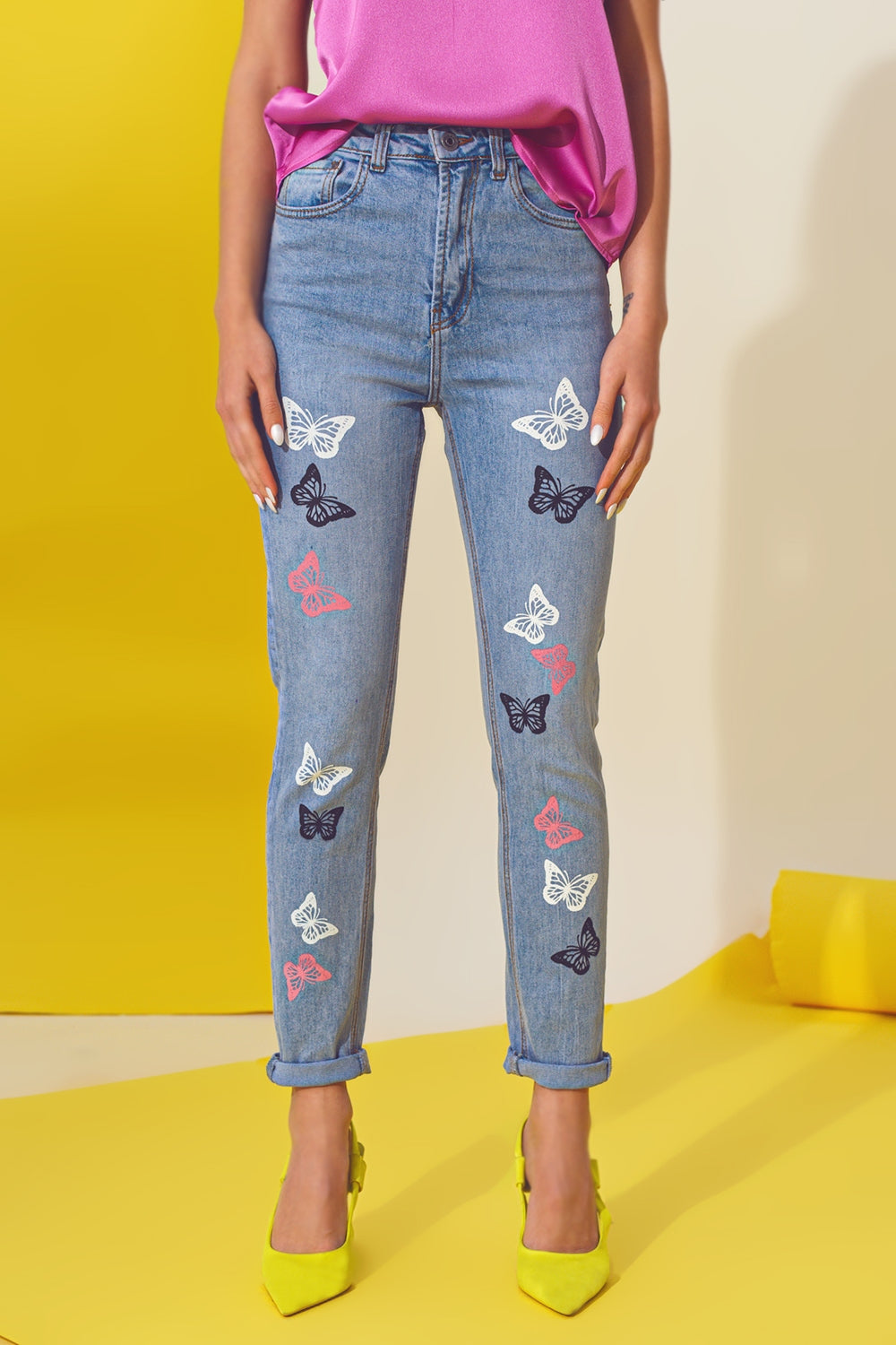 Jean skinny avec détail papillon délavé bleu clair