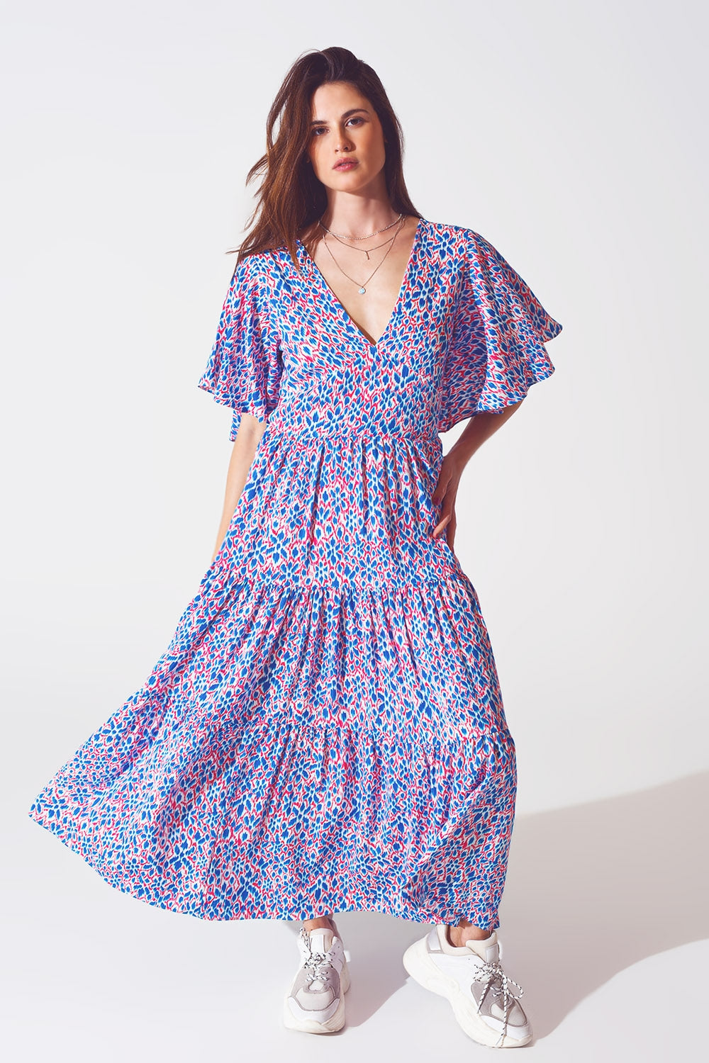 Robe longue avec dos ouvert et lien à nouer dans un imprimé violet