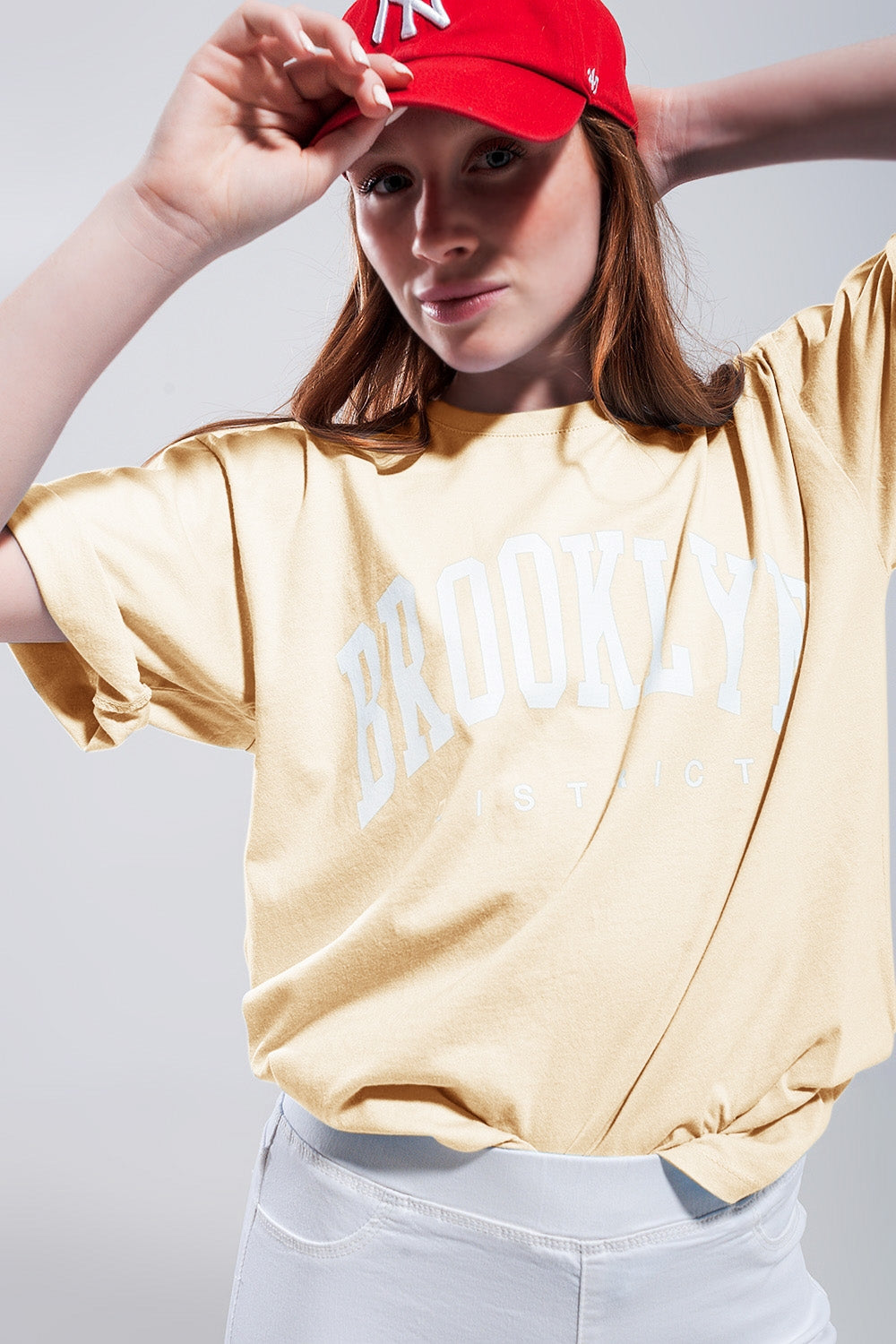 T-shirt avec texte Brooklyn District en jaune