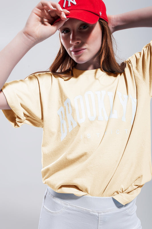 T-shirt avec texte Brooklyn District en jaune