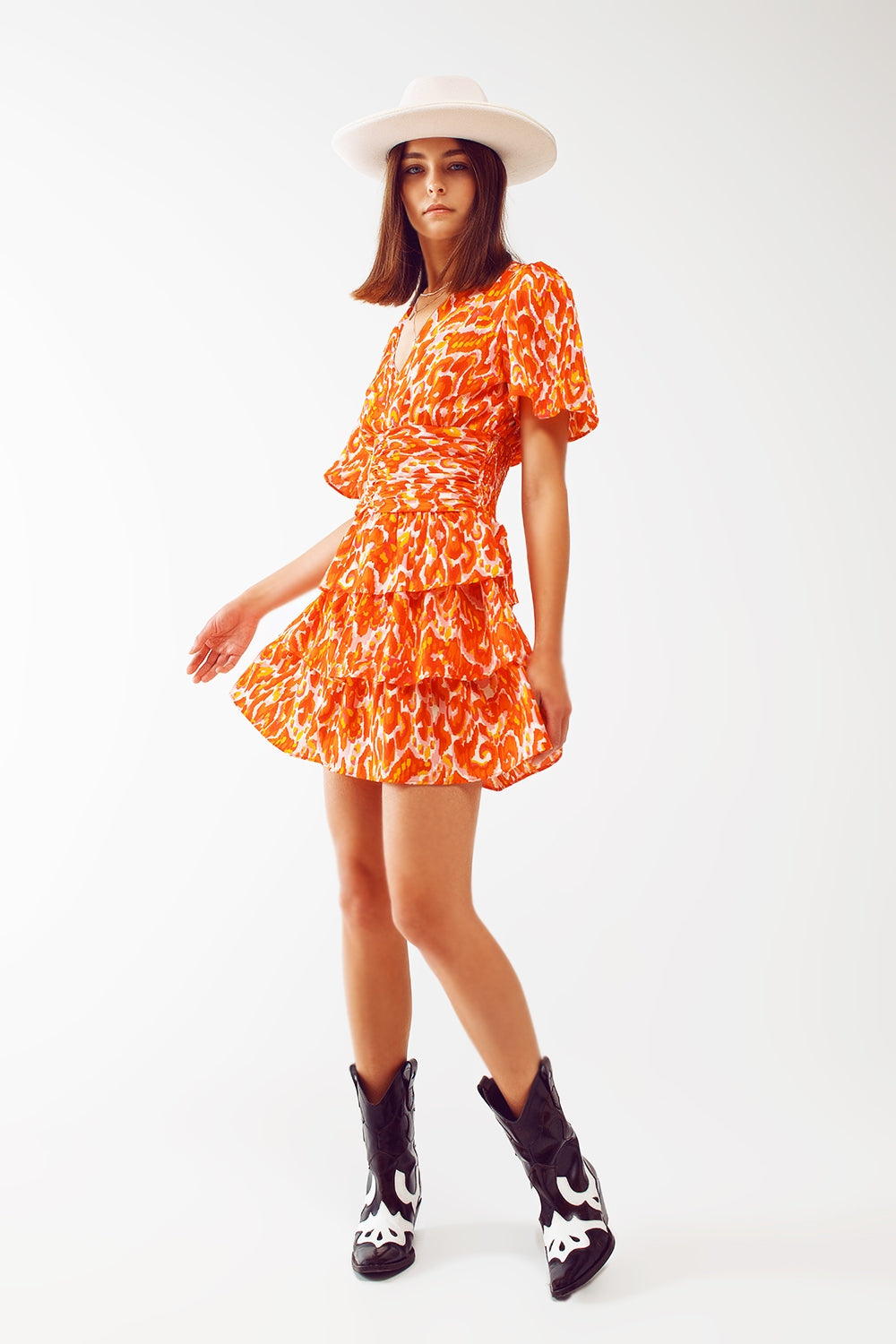 Robe mini à col en V avec imprimé floral orange