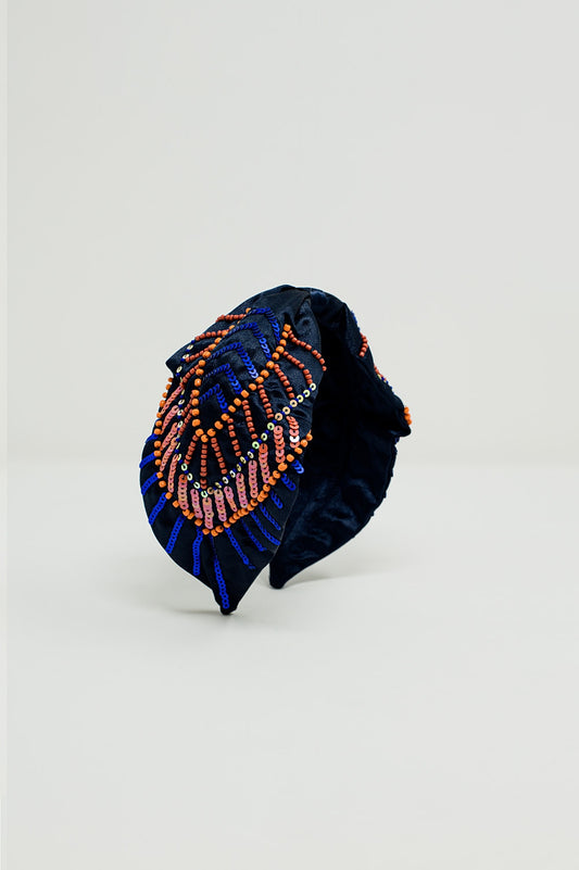 Bandeau bleu marine avec des ornements en sequins et strass